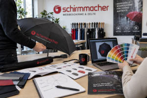 Vom Logo zur Druckfläche: wie viel Gestaltung verträgt ein Regenschirm? Die Gestaltungslogik von Schirmmacher Schließband, Griff und Innenseite: die unterschätzten Flächen